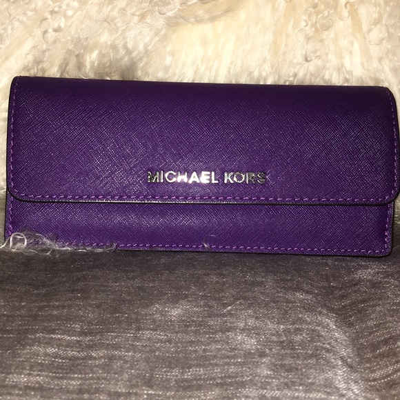 Michael Kors Handbags - Michael Kors deep purple wallet